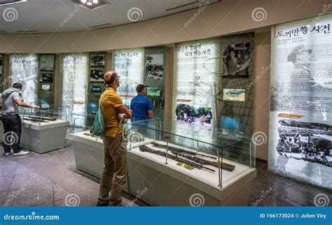 Tourists Inside 3rd Infiltration Tunnel DMZ Museum Exhibition Hall with Weapons Exhibit in DMZ ...