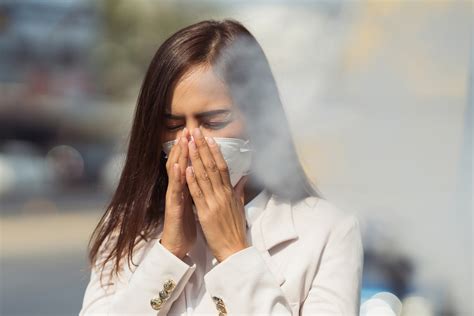 Woman coughing due to smoke smoke-free policy for indoor air mil gracias dangers of secondhand ...