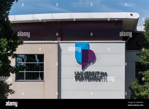 University of Portsmouth sign and logo on a building on the campus ...