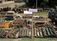 LTTE weapons, ammunition, explosives, communication equipment and other accessories on display ...