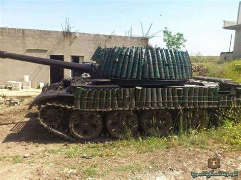 SAA T-62 with spent shells used as armor. May 2015 : Military