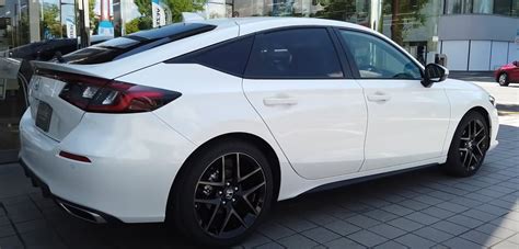 2022 Honda Civic Hatchback EX trim in Platinum White Pearl + 235/40 18 ...