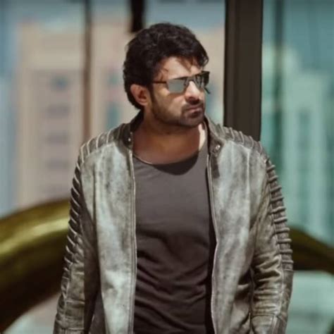 Prabhas' expression after a crazy fan softly slaps him and jumps in joy ...