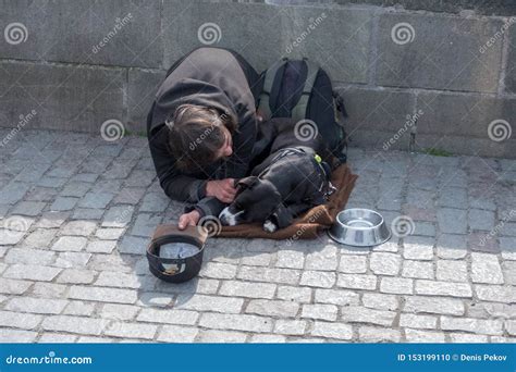 Beggar, Homeless with Dog Near Charles Bridge, Prague, Czech Republic Editorial Image - Image of ...