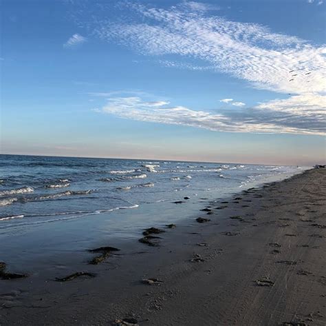 Sun setting over Corpus Christi, Texas Beach. Near Bob Hall Pier. | Ciudades