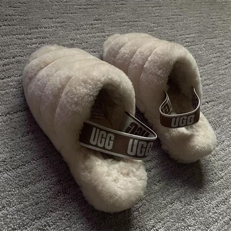 Barely worn fluffy Ugg slippers The small marks are... - Depop