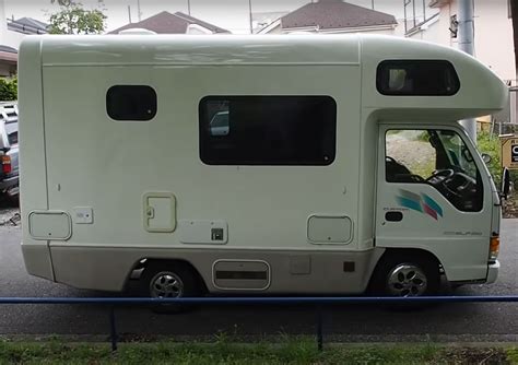 Tiny Isuzu Elf Camper RV Is a Tight World Solution to Travel