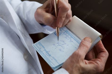 Dr. Writing a Prescription Stock Photo | Adobe Stock