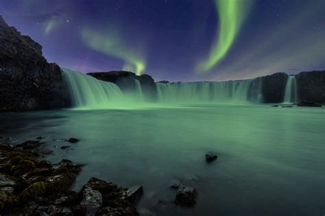 Aurora Borealis over Godafoss waterfall in Iceland - Alexios Ntounas Photography