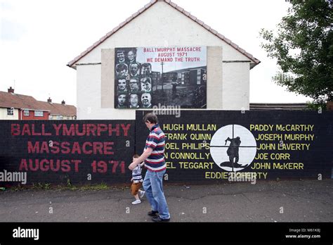 Murals dedicated to the 1971 Ballymurphy Massacre seen on a wall in ...