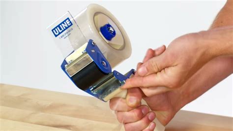 How to Load a Packing Tape Gun Dispenser - YouTube