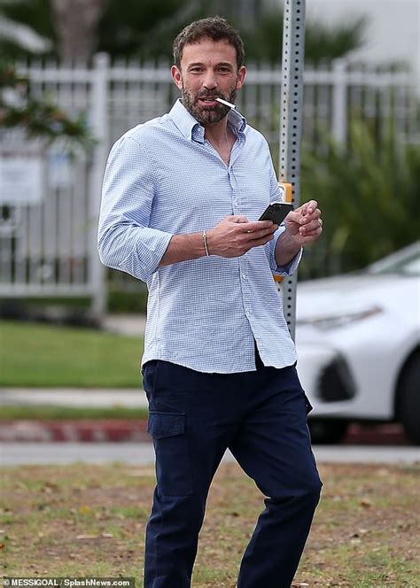 Ben's breakfast! Affleck enjoys a cigarette and iced coffee as he ...