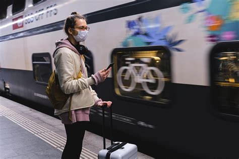 Woman With a Face Mask Waiting for a Train · Free Stock Photo