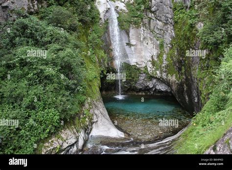 pond and waterfall at Cangshan Mountain, Dali, China Stock Photo - Alamy