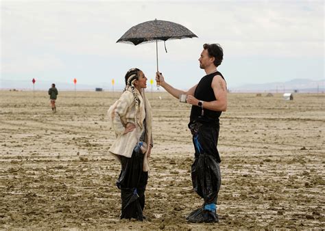 Photographer at This Year's Burning Man Captures Rain, Mud, and Love ...