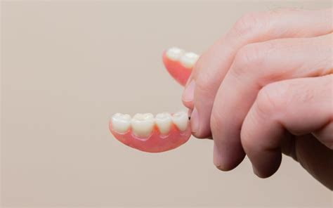 Your Guide to Dental Bridges vs. Partial Dentures - Northside Dental Co.