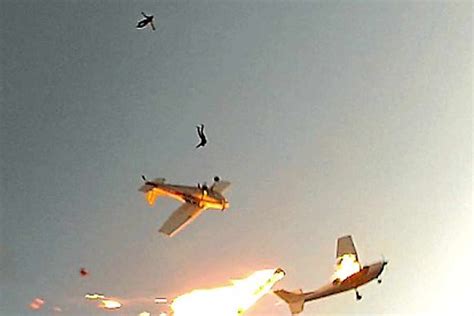 Video: Terrifying moment skydivers survive mid-air plane collision ...