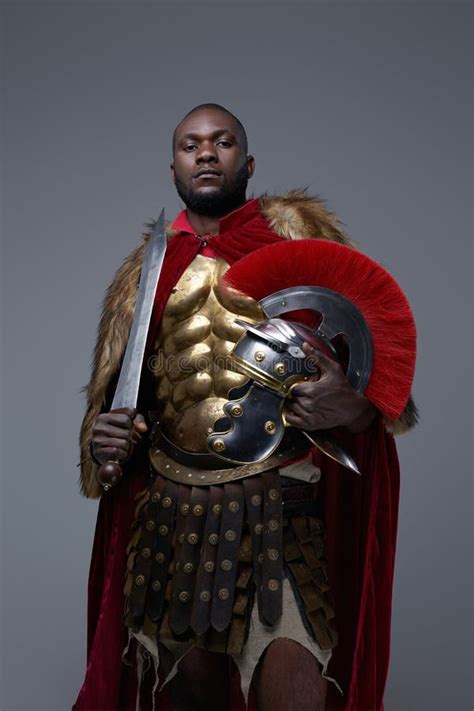 Black Roman Soldier with Sword on His Shoulder Stock Image - Image of ...