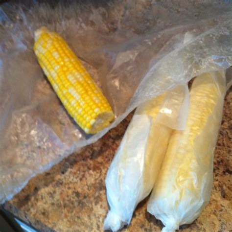 Microwave corn on the cob. Wrap each ear in waxed paper; place on paper towels in the microwave ...