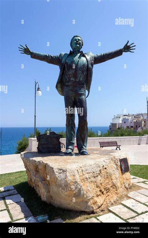 Italy, Apulia, Polignano a Mare, Domenico Modugno statue Stock Photo ...