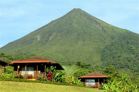 Arenal Volcano cabins stock image. Image of cabin, blue - 25567059