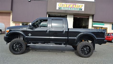 Lifted Trucks: Retractable Steps For Lifted Trucks