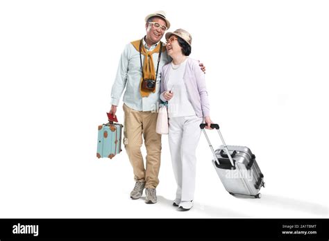 Happy travel elderly couple Stock Photo - Alamy