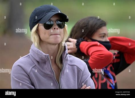 Elin Nordegren, left, and Sam Alexis Woods watch Tiger Woods and ...