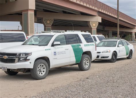 El Paso, Texas, USA September 29, 2022 Border Patrol Vehicles Parked along the US Border in ...