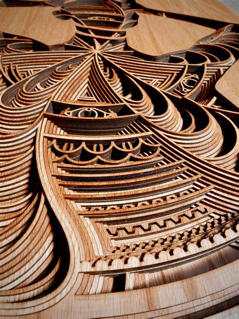 Cut Plywood Relief Sculptures Embedded with Mandalas and Geometric ...