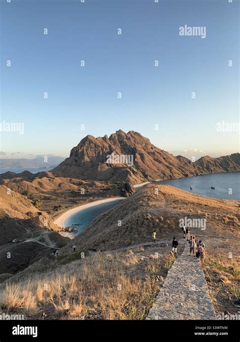 Pulau Padar hiking in beautiful morning Stock Photo - Alamy