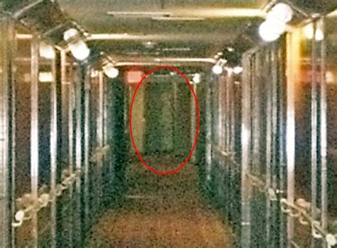 A White Lady floats at the end of a corridor - in a photo said to depict the ghostly inhabitant ...