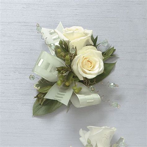 Todays corsages and boutonnieres range from dramatic and sophisticated floral clusters to simply ...