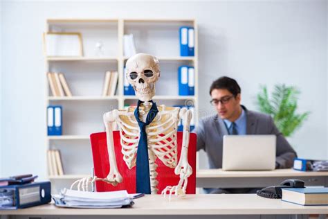 The Businessman Working with Skeleton in Office Stock Image - Image of ...