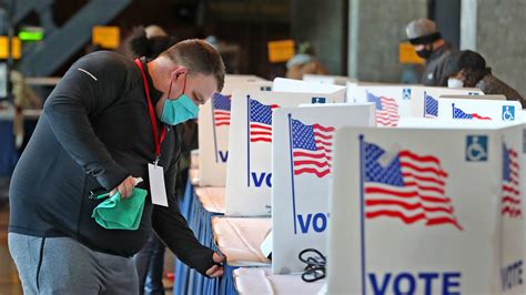 Early voting in Indiana means hours in line, 2 weeks in quarantine