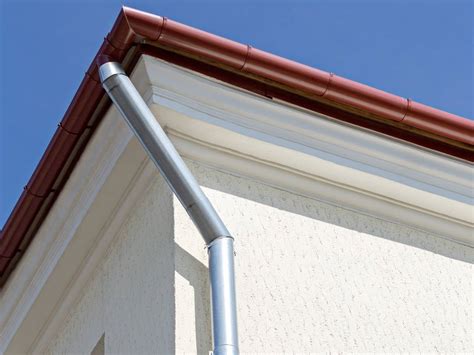 How to Install or Replace a Gutter Downspout