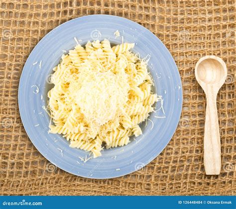 Grated Cheese on Pasta on White Background Stock Photo - Image of fusilli, dairy: 126448484