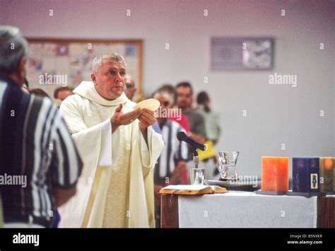 Catholic priest holds host hi-res stock photography and images - Alamy