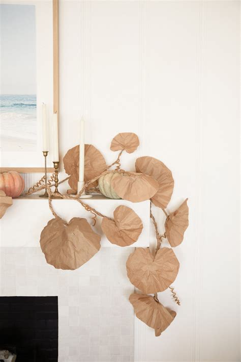 My DIY Fall Leaf Garland Mantel Décor - Lauren Conrad | Fall leaf garland, Diy fall garland ...