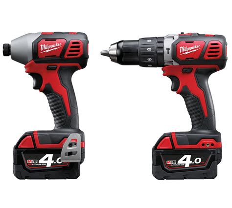 Milwaukee M18 Combi Drill & M18 Impact Driver 2x4ah Batteries each