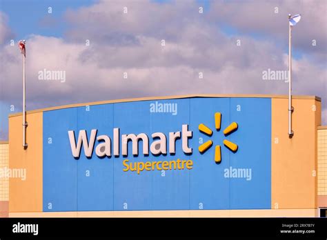 Sign over the front entrance of a Walmart Supercentre Stock Photo - Alamy