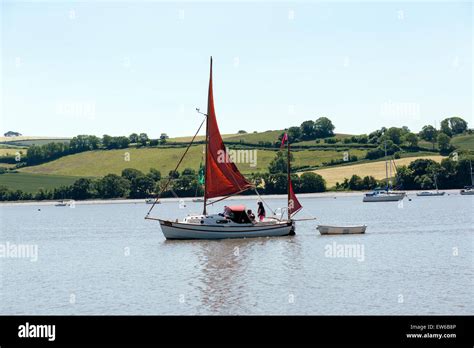 red sailed drifter boat on river dart,stoke gabriel,mill pond,moored ...