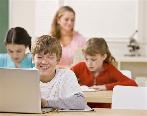 Student Using Laptop in Classroom Stock Photo - Image of caucasian ...