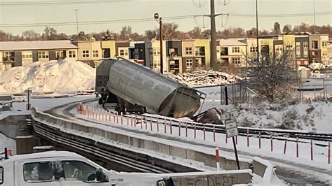 Train derails in Denver, cars fall into South Platte River | 9news.com