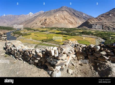 Fields aroun Panj river, Gorno-Badakhshan, Hindukush mountains Tajikistan and Afghanistan border ...