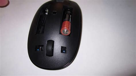 How to put in or change batteries in an HP wireless mouse - YouTube