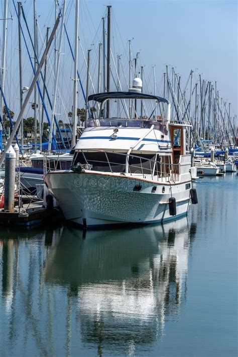 Moored Boat and Its Reflection Stock Image - Image of docks, reflections: 76381325