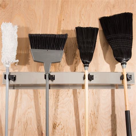 Bobrick B-223 36" Stainless Steel Mop / Broom Rack with 4 Holders