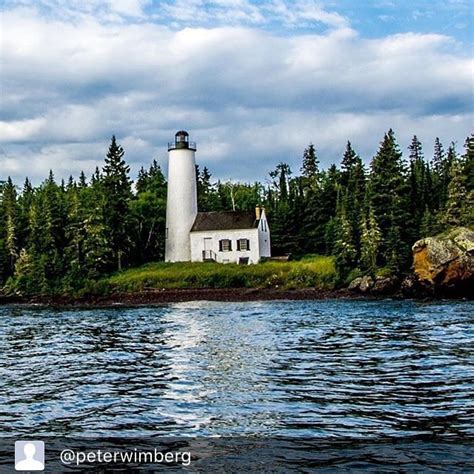 The Rock Harbor Lighthouse, located at the southwest entrance to Rock Harbor, is one of four ...