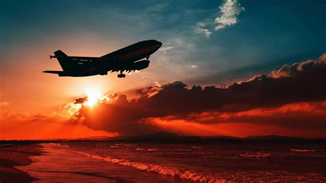 1366x768 Airplane Flying Over Beach Shore Sunset 5k 1366x768 Resolution HD 4k Wallpapers, Images ...